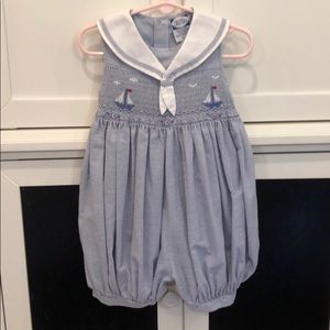 Sailboat romper for toddler girls.
